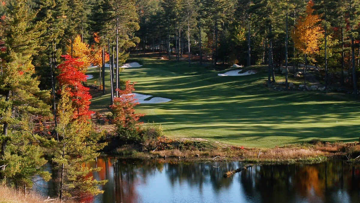 Photo of of golf hole over the water at Lake Winnipesaukee Golf Club.